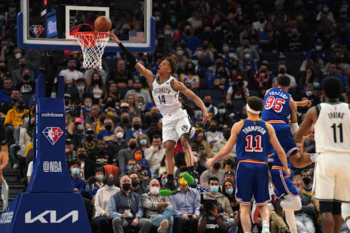 Brooklyn Nets forward Kessler Edwards (14) misses a dunk attempt against the Golden State Warriors in the second quarter at the Chase Center.
